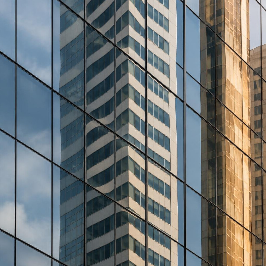 Abstract reflection of a city building in glass windows